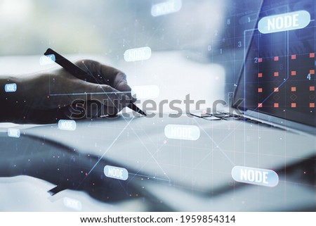 Double exposure of abstract programming language with hand writing in notebook on background with laptop, research and development concept