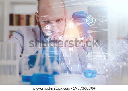 Doctor in doctor's coat working in medical lab