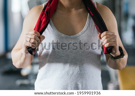 Man with a towel at the gym. Mask. Concept of health