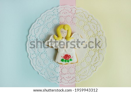  food art. cookies in shape of Angel. easter background. pastel colours.                        