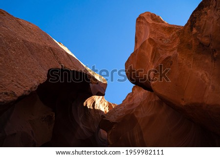 A beautiful view of amazing sandstone formations in the famous Antelope Canyon on a sunny day, USA