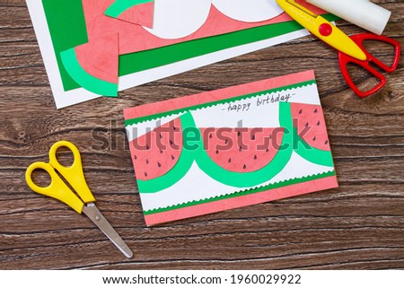 Summer birthday card with watermelons with birthday greetings. Handmade. Childrens creativity project, crafts for kids.