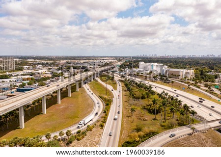 Aerial photo above the Golden Glades Interchange highway merge lanes with flyover