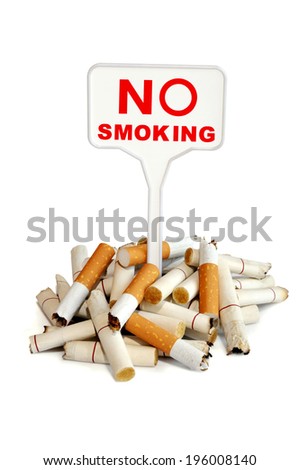 No smoking. A bunch of cigarette butts and prohibiting sign on a white background