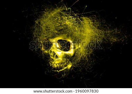 Photo in the style of light painting, abstract, skull on a black background