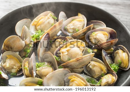 Close-up of steamed clams Royalty-Free Stock Photo #196013192