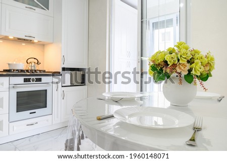 Luxurious white modern kitchen interior. High quality photo