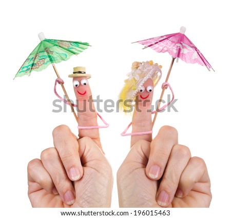 Caricature made of a finger puppet representing a happy couple