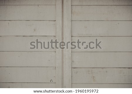 A white colored wooden fence texture