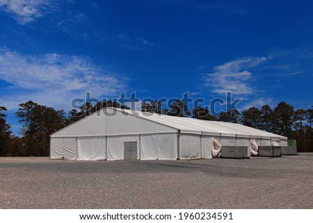 White rental tent, heavy duty canvas building
