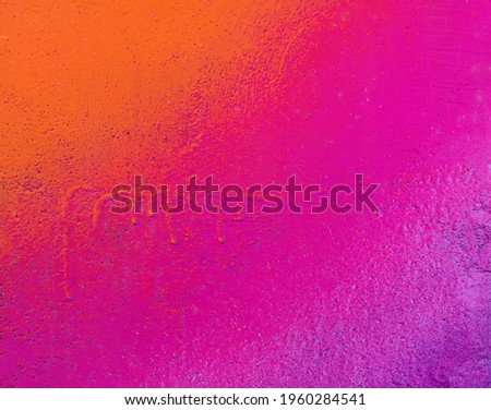 Beautiful bright colorful street art graffiti background. Abstract creative spray drawing fashion colors on the walls of the city. Urban Culture gradient texture, backdrop Royalty-Free Stock Photo #1960284541