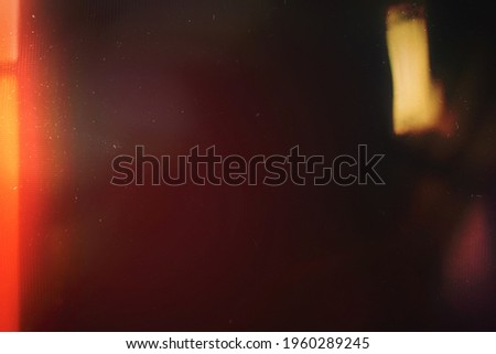 Background of retro film overly, image with scratch, dust and light leaks Royalty-Free Stock Photo #1960289245