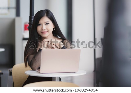 businesswoman using computer , technology working with happy.