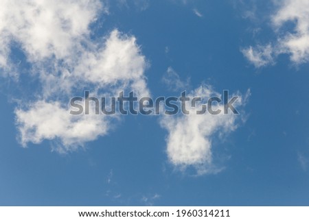 Soft white clouds texture on beautiful afternoon sky background. Image for background design The clear sky makes you feel fresh and clear.