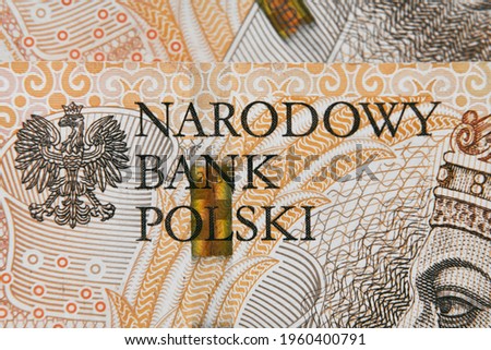 Macro photo of Polish zloty. A sign of National Bank of Poland