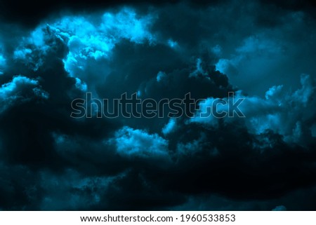   Dark blue green sky. Thunderclouds. Dramatic sky background with copy space for design. Web banner. Epic scene. Majestic, magical, creepy, fantastic, horror, mystical.                             