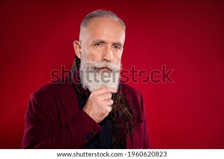 Photo portrait of old man with white beard contemplated isolated on bright red color background