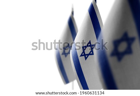 Small national flags of the Israel on a white background