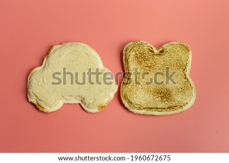 Car Shaped Bread and Fail Toast Rabbit Shaped Bread On the Pink Background.