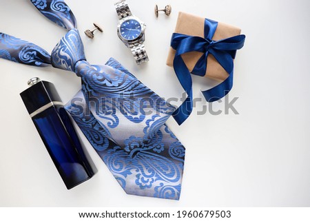 Happy father's day greeting card . set of men's accessories. men's tie, watches, cufflinks and cologne. gift concept 