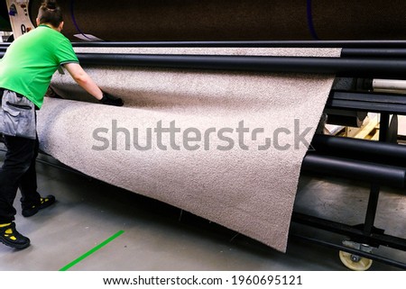 Modern carpet for textile design. The concept of industrial technology. Production automation. Textured background Royalty-Free Stock Photo #1960695121