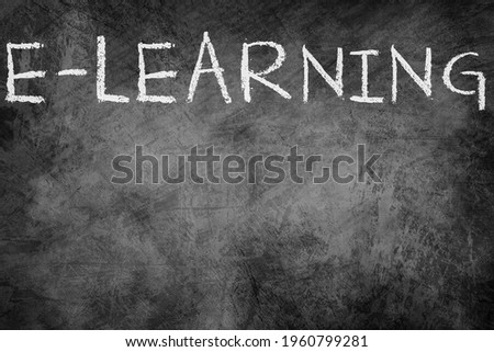 Hand drawn e-learning sketch on chalkboard background with text. Online education and e-learning concept.