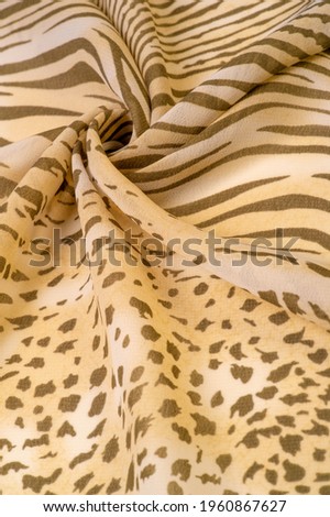 silk fabric in brown and white stripes, zebra skin in African style. Repeating striped background texture. For the designer, the sketch of the layout, the entourage of the decorator. 
