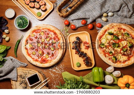 Pizza with bacon, tomatoes, cheese and olives. Italian Cuisine.