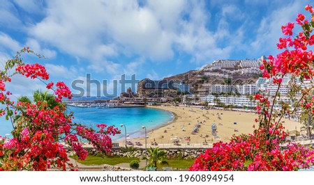 Landscape with  Puerto Rico village and beach on Gran Canaria, Spain Royalty-Free Stock Photo #1960894954