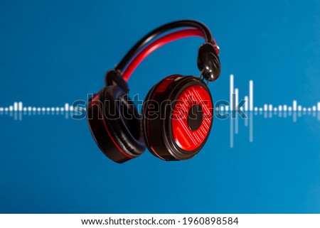 audio headphones with digital audio spectrum concept, podcast, music Royalty-Free Stock Photo #1960898584