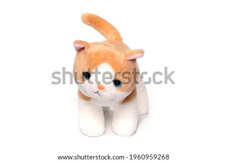 Funny toy cat isolated on white