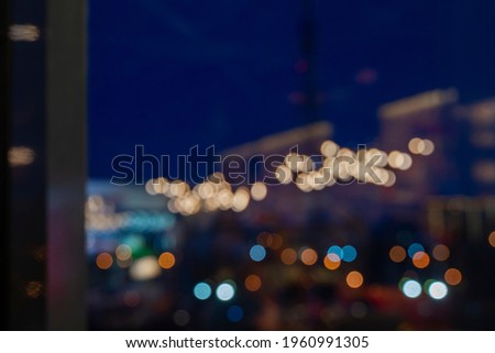 Defocused White  and multicolored Lights Over  Dark Background. Abstract background. 