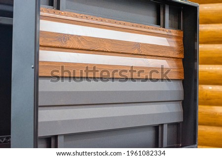 Sample of fastening metal-plastic doors. Metal siding in the film