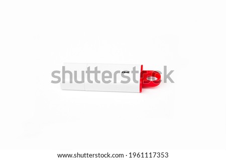 White flash drive isolated on white background.