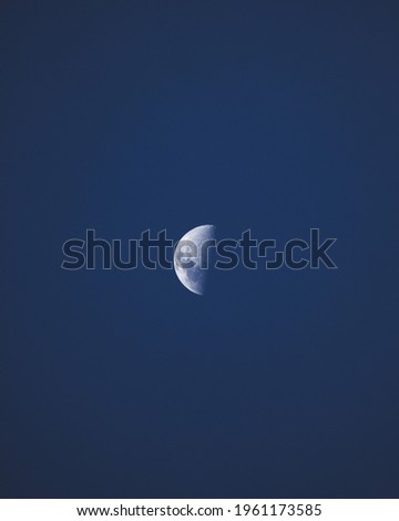 picture of the moon with blue background