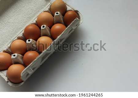 chicken eggs in a cardboard box
