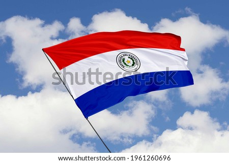 Paraguay flag isolated on sky background with clipping path. close up waving flag of Paraguay. flag symbols of Paraguay.