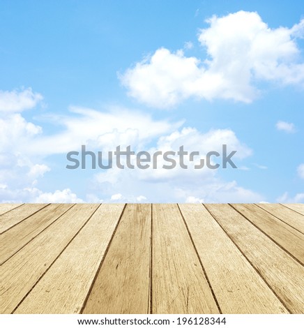 Blue sky and wood in perspective.