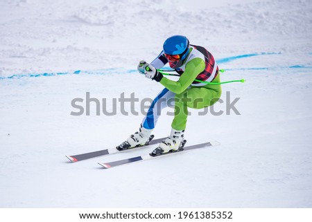 Skier on a slope of the alps Royalty-Free Stock Photo #1961385352