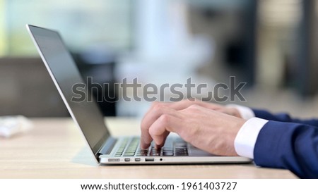 Close up of Hands Typing on Laptop 