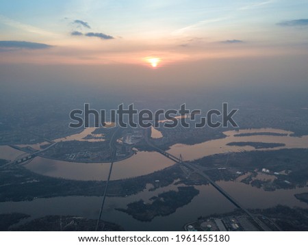 Sunset over the Dnieper River in Kiev. Aerial high view.