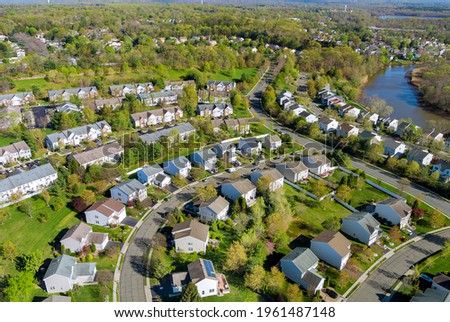 Aerial view of small american town residential houses neighborhood complex at suburban housing development