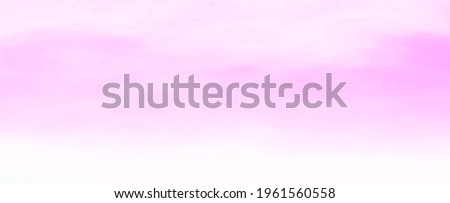 Blurred pink sky and clouds for natural background design in panorama view.