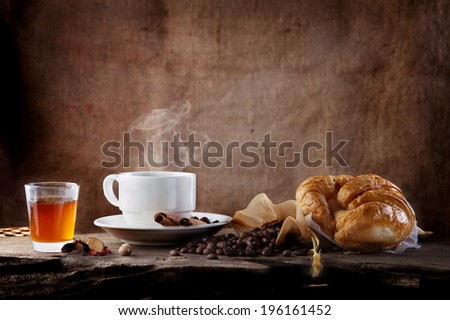 breakfast hot coffee  with honey and croissant