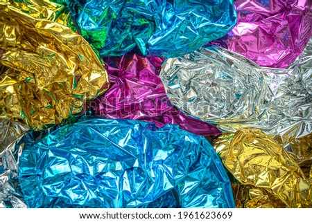 Colorful shiny foil background for the holiday