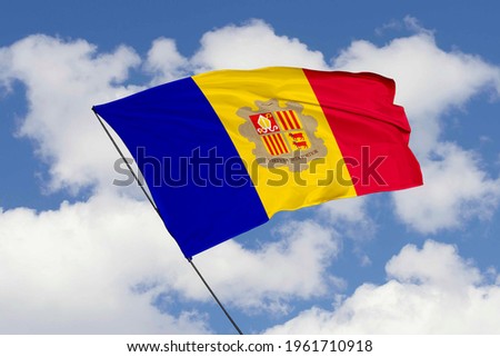 Andorra flag isolated on sky background with clipping path. close up waving flag of Andorra. flag symbols of Andorra.