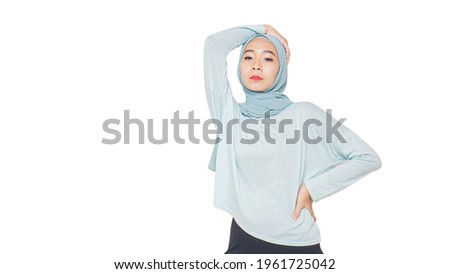 Portrait of hijab girl. Pretty muslim girl. Beautiful asian muslimah woman model posing on white background studio.