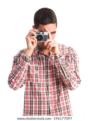young man taking a photo