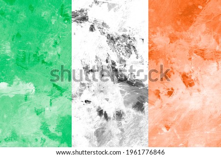 Republic Ireland, irish flag on concrete textured background. Flag of Ireland overlaid with grunge texture. Vintage grunge patriotic flag.