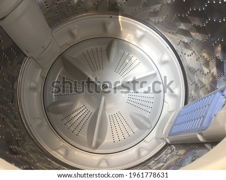 Interior picture of the top-loading washing machine